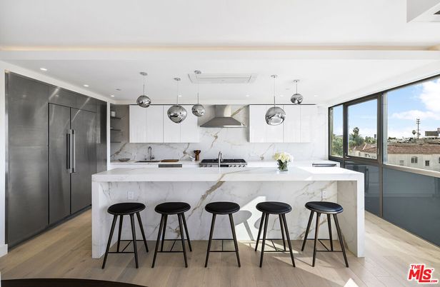 Interior, Kitchen, Marble Walls, Pendant Lights, Recessed Lighting, Stainless Steel Appliances, Wood Texture Flooring