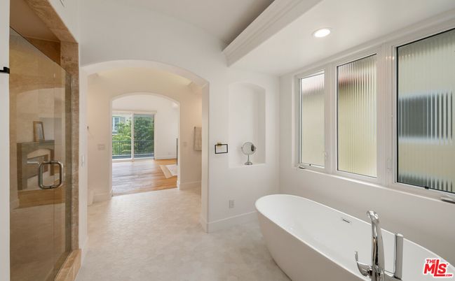 Bathroom, Free Standing Baths, Glass Shower, Interior, Recessed Lighting, Wood Texture Flooring