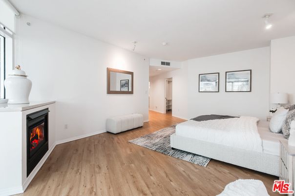 Bedroom, Fireplace, Interior, Recessed Lighting, Wood Texture Flooring