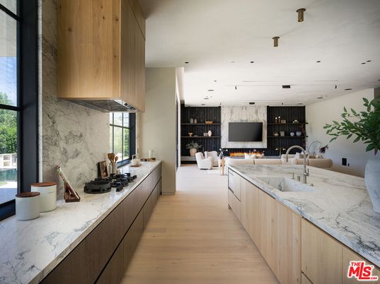 Dining room, Interior, Kitchen, Living room, Marble Walls, Pendant Lights, Recessed Lighting, Wood Texture Flooring