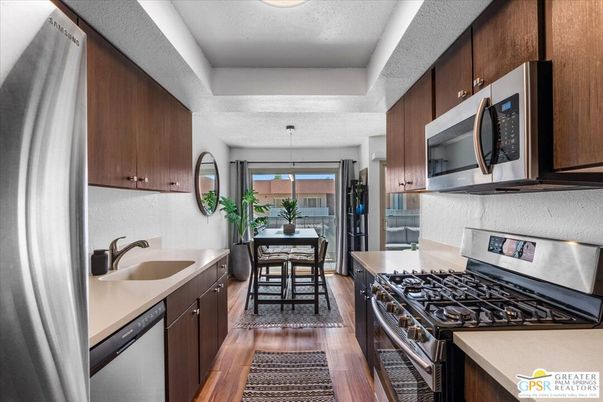 Dining room, Interior, Kitchen, Pendant Lights, Stainless Steel Appliances, Wood Texture Flooring