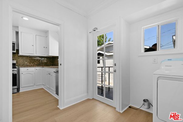 Interior, Kitchen, Recessed Lighting, Washer, Wood Texture Flooring