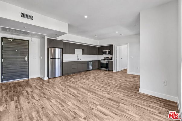 Interior, Kitchen, Recessed Lighting, Stainless Steel Appliances, Wood Texture Flooring