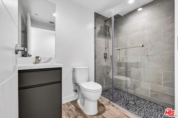Bathroom, Glass Shower, Interior, Recessed Lighting, Wood Texture Flooring