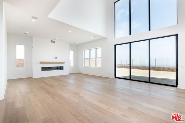 Empty room, Fireplace, Interior, Recessed Lighting, Wood Texture Flooring
