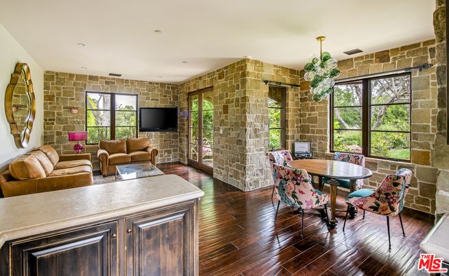 Dining room, Interior, Living room, Recessed Lighting, Stone Walls, Wood Texture Flooring