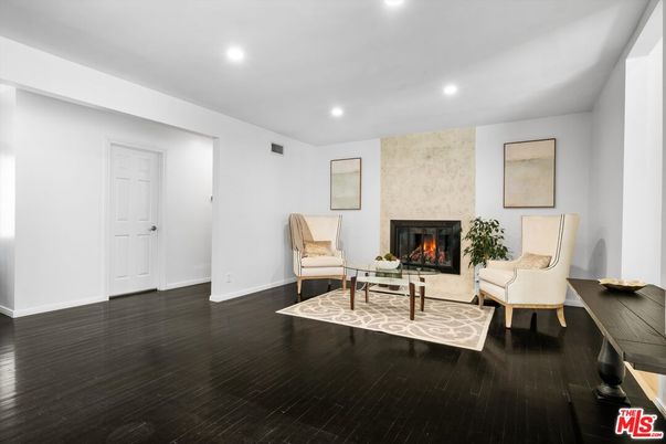 Fireplace, Interior, Living room, Recessed Lighting, Wood Texture Flooring