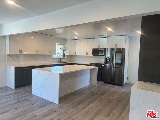 Interior, Kitchen, Marble Walls, Recessed Lighting, Wood Texture Flooring
