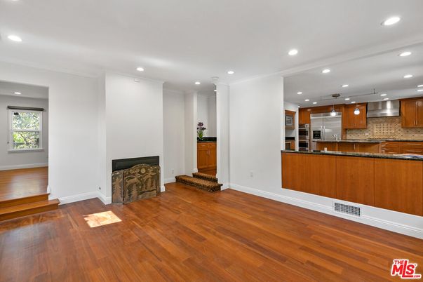 Fireplace, Interior, Kitchen, Pendant Lights, Recessed Lighting, Stainless Steel Appliances, Wood Texture Flooring