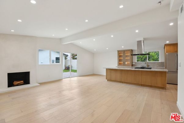 Empty room, Fireplace, Interior, Kitchen, Recessed Lighting, Wood Texture Flooring