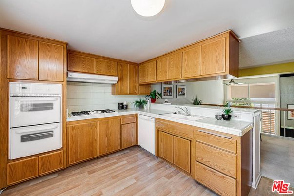 Interior, Kitchen, Tile Countertops, Wood Texture Flooring