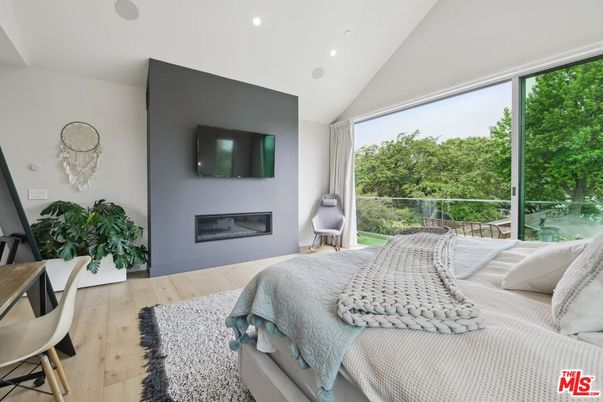 Bedroom, Fireplace, Interior, Recessed Lighting, Wood Texture Flooring