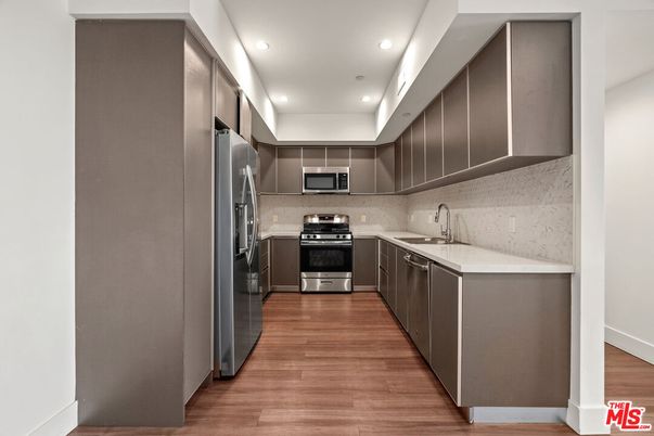 Interior, Kitchen, Recessed Lighting, Stainless Steel Appliances, Wood Texture Flooring