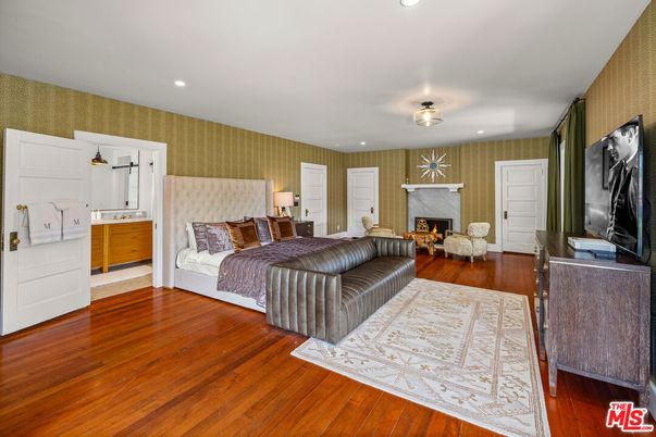 Bedroom, Fireplace, Interior, Recessed Lighting, Wood Texture Flooring