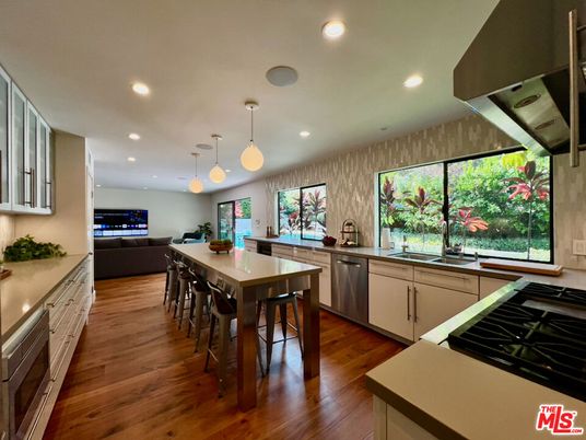 Dining room, Interior, Kitchen, Pendant Lights, Recessed Lighting, Stainless Steel Appliances, Wood Texture Flooring