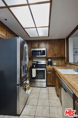 Interior, Kitchen, Stainless Steel Appliances, Tile Countertops