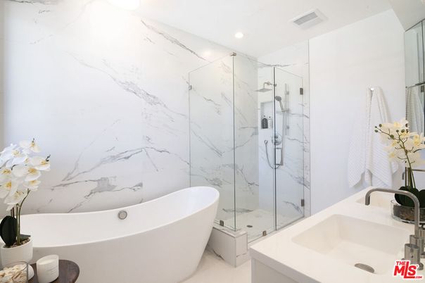 Bathroom, Free Standing Baths, Glass Shower, Interior, Marble Walls, Recessed Lighting