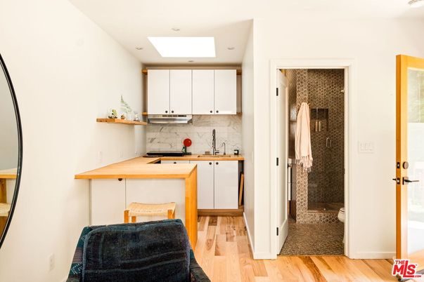 Interior, Kitchen, Marble Walls, Recessed Lighting, Wood Texture Flooring