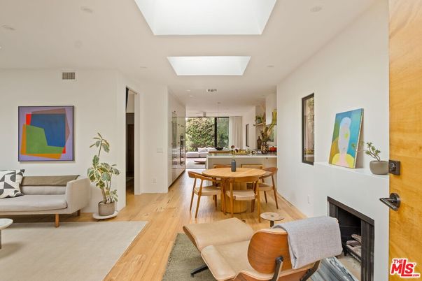 Dining room, Fireplace, Interior, Living room, Recessed Lighting, Wood Texture Flooring