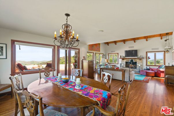 Chandelier, Dining room, Fireplace, Interior, Living room, Wood Texture Flooring