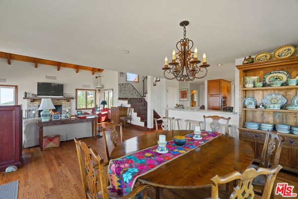 Chandelier, Dining room, Fireplace, Interior, Kitchen, Living room, Recessed Lighting, Wood Texture Flooring