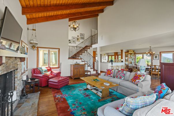 Chandelier, Dining room, Fireplace, Interior, Living room, Pendant Lights, Wooden Beams, Wooden Ceilings, Wood Texture Flooring