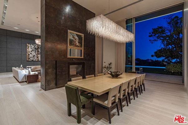 Chandelier, Dining room, Fireplace, Interior, Living room, Pendant Lights, Recessed Lighting, Wood Texture Flooring