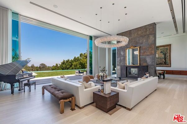 Chandelier, Fireplace, Interior, Living room, Pendant Lights, Piano, Recessed Lighting, Wood Texture Flooring