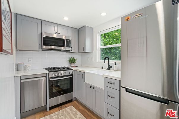 Interior, Kitchen, Recessed Lighting, Stainless Steel Appliances, Wood Texture Flooring