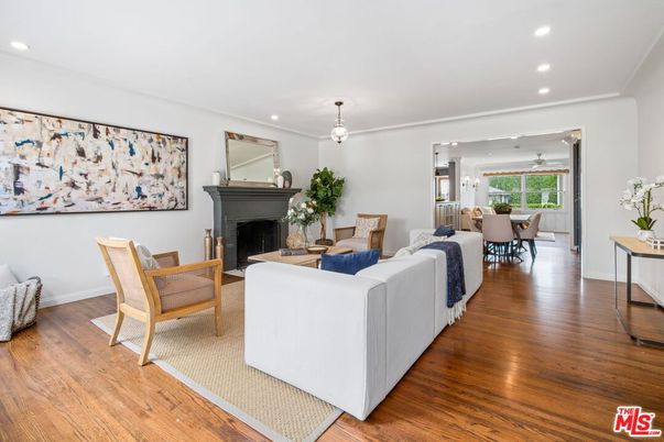 Dining room, Fireplace, Interior, Living room, Pendant Lights, Recessed Lighting, Wood Texture Flooring