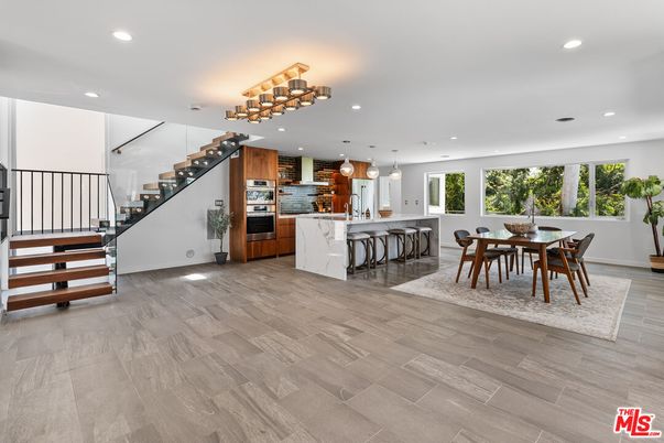 Dining room, Interior, Kitchen, Pendant Lights, Recessed Lighting, Stainless Steel Appliances, Wood Texture Flooring