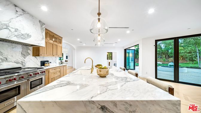 Interior, Kitchen, Marble Walls, Pendant Lights, Recessed Lighting, Stainless Steel Appliances, Wood Texture Flooring