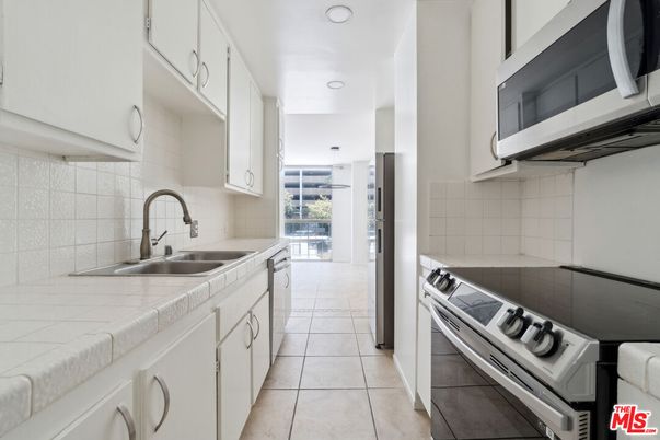 Interior, Kitchen, Recessed Lighting, Tile Countertops