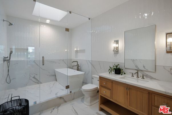 Bathroom, Dual Sink Vanities, Free Standing Baths, Glass Shower, Interior, Marble, Marble Walls, Recessed Lighting