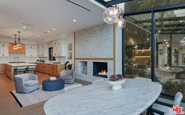 Dining room, Fireplace, Interior, Kitchen, Living room, Pendant Lights, Recessed Lighting, Stone Walls, Wood Texture Flooring
