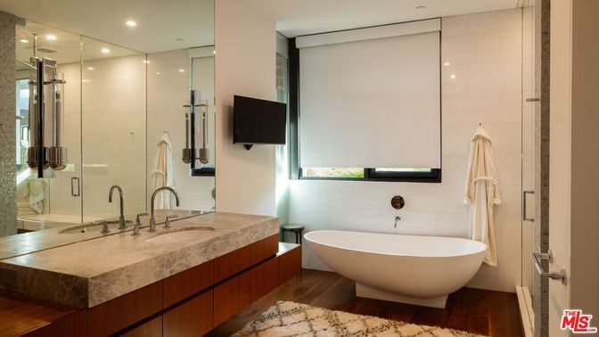 Bathroom, Dual Sink Vanities, Free Standing Baths, Glass Shower, Interior, Recessed Lighting, Wood Texture Flooring