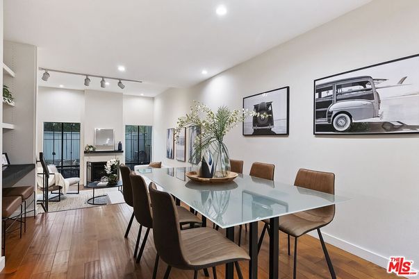 Dining room, Fireplace, Interior, Living room, Recessed Lighting, Wood Texture Flooring
