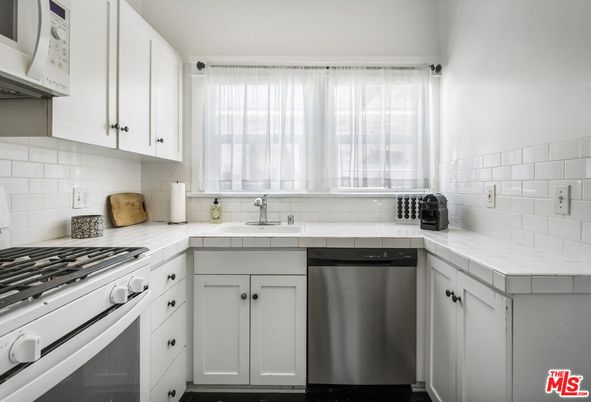 Interior, Kitchen, Stainless Steel Appliances, Tile Countertops