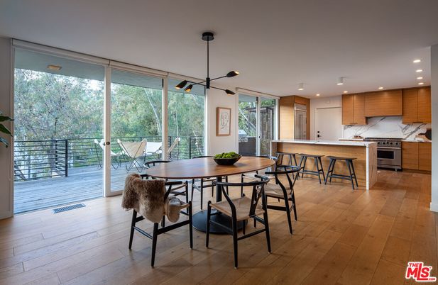Dining room, Interior, Kitchen, Pendant Lights, Recessed Lighting, Stainless Steel Appliances, Wood Texture Flooring