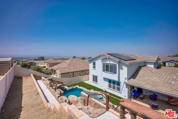 Exterior, Pool, Solar Panels