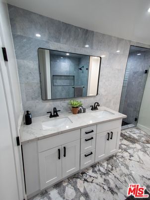 Bathroom, Dual Sink Vanities, Interior, Marble, Marble Walls, Recessed Lighting