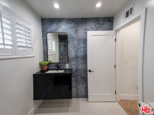 Bathroom, Dual Sink Vanities, Interior, Recessed Lighting, Wood Texture Flooring