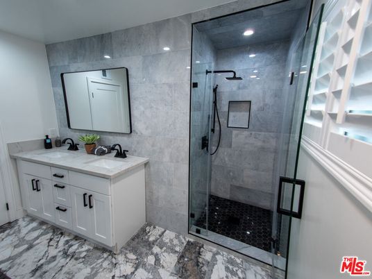 Bathroom, Dual Sink Vanities, Glass Shower, Interior, Marble, Recessed Lighting