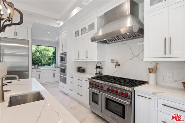 Interior, Kitchen, Marble, Marble Walls, Recessed Lighting, Stainless Steel Appliances, Wood Texture Flooring