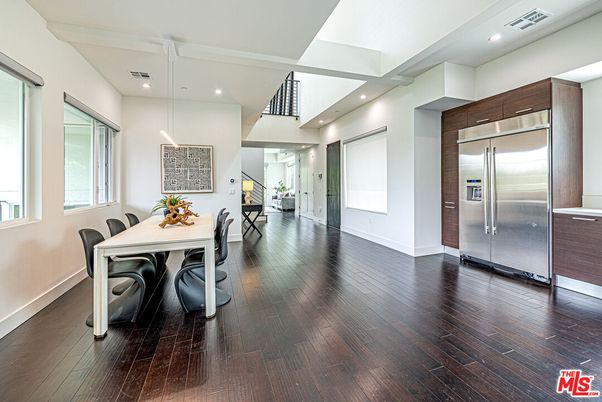 Dining room, Interior, Pendant Lights, Recessed Lighting, Stainless Steel Appliances, Wood Texture Flooring