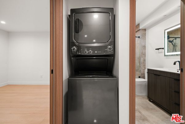 Bathroom, Interior, Recessed Lighting, Utility Closets, Washer, Wood Texture Flooring