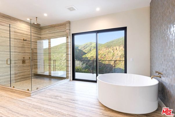 Bathroom, Free Standing Baths, Glass Shower, Interior, Recessed Lighting, Wood Texture Flooring
