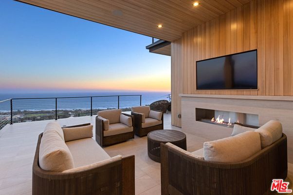 Exterior, Fireplace, Interior, Living room, Recessed Lighting, Water, Wooden Ceilings, Wooden Walls