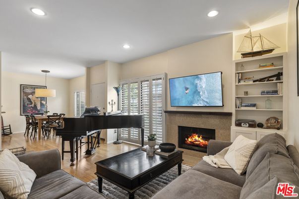 Dining room, Fireplace, Interior, Living room, Pendant Lights, Piano, Recessed Lighting, Wood Texture Flooring