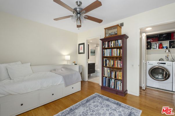 Bedroom, Interior, Recessed Lighting, Utility Closets, Washer, Wood Texture Flooring